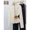 Camiseta básica de punto color verde menta para mujer, estilo coreano otoño e invierno, color liso, manga larga, top interior suave y acogedor