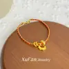 Nova Pulseira Dourada com Filigrana Oca para Mulheres, Pulseira Dourada com Corda Vermelha Retrô, Pulseira Simples, Versátil e de Alto Padrão