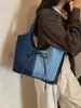 Bolso tote de gran capacidad para mujer, nuevo modelo de verano 2025, bolso simple casual para el hombro estilo ins, bolso versátil de moda para mujer