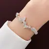 Novo conjunto de pulseiras com figura 8 infinito cravejado de diamantes, transfronteiriço europeu e americano, joias da moda em liga metálica simples retrô criativa, atacado
