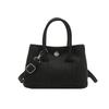 2025 Versión Coreana Nuevo Bolso de Cubo de Mano Casual Simple para Viajar Textura Color Sólido Bolso de Mano de Axila Bolso Cruzado para Mujeres