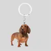 Chaveiro plano 2D pingente de mochila de férias cachorro de desenho animado criativo acrílico pequeno presente para eventos transfronteiriços