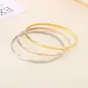 Anel Simples de Aço Inoxidável Transfronteiriço Multiespecificação Anel Único Anéis Múltiplos Empilhados Superfície Esférica Banhado a Ouro 18K 3,6 mm de Largura Pulseira de Aço Titânio