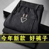 Pantalones casuales para hombre transfronterizos invierno más terciopelo grueso pana pantalones de hombre comercio exterior sueltos pierna recta pana pantalones deportivos