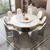 Conjunto de mesa de jantar e cadeiras em pedra laminada estilo italiano, design minimalista moderno, adequado para apartamentos pequenos, casas e hotéis de luxo leve, com tampo de mesa redondo giratório
