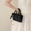 Moderna minibolso Boston con colgante de caballo de madera, exquisito bolso cruzado para mujer, adecuado para ir al trabajo y con un estilo único
