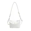 Bolsa tote bucket texturizada estilo coreano para mulheres no atacado, nova coleção outono 2026, bolsa de ombro trançada de cor sólida, bolsa crossbody para o dia a dia