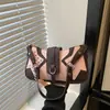 2026 Otoño Temprano Nuevo de Moda Chica Caliente Diseño de Nicho Bolso de Motocicleta Bolso de Hombro Único Bolso de Axila Bolso de Mano para el Trabajo Bolso de Mujer