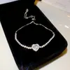 Pulsera redonda de circonita cúbica transfronteriza europea y americana, una pieza lujosa y discreta con un toque de alta gama, perfecta para el uso diario y versátil para cualquier atuendo
