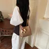 Bolso de mano retro versátil de nicho estilo coreano para mujer, nuevo modelo otoño 2026, bolso cruzado tipo cubo texturizado de alta calidad