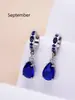 Conjunto de collar y aretes transfronterizos europeo y americano piedra de nacimiento de diciembre circonita acero inoxidable colgante de gota