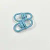 Fábrica de Origen de Broches Giratorios de Figura de Ocho, Galvanizados en Tres Colores, Opcional con Esmalte Sellado, Paquete de 50 Llaveros para Joyería de Aleación de Zinc