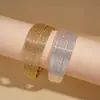 Pulsera Abierta Geométrica Redonda Metálica Multicapa Europea y Americana, Estilo Minimalista Versátil, Joyería Única y de Alta Gama para Mujeres