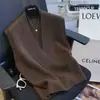 Nueva colección de otoño e invierno: Chaleco de punto oversized con cuello en V 100% lana para mujer, corte holgado y estilizado, perfecto como capa o para llevar como chaleco sin mangas.