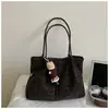 Bolso de hombro de gran capacidad con estampado de leopardo, nuevo bolso de axila para el trabajo, bolso versátil de moda casual de alta gama de nicho para mujer