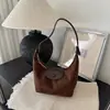 Bolso tipo dumpling con estampado de leopardo de moda transfronterizo, nueva colección otoño 2026, bolso de hombro elegante y sofisticado para mujer