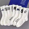 Calcetines Deportivos Largos para Hombre, Versátiles, Resistentes al Olor, de Moda, para Otoño e Invierno, Nuevos Calcetines Largos de Baloncesto para Pareja