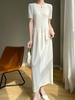 Vestido de punto Quzhu de alta calidad, de manga corta, puro y suave, para mujer, primavera/verano 2024, nueva falda larga, cintura ajustada y adelgazante.