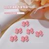 Nail art liga joias creme rosa tridimensional amor Bow Cross urso unha decoração acessórios atacado