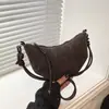 Bolso pequeño retro Shuai Mi para mujer, nuevo bolso de moda tipo 'dumpling' otoño 2026, bolso de hombro texturizado, bolso cruzado para el día a día