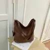 Bolsa de alta qualidade, luxo leve, com textura tecida para mulheres, 2026, nova, verão, nicho, super popular, para o dia a dia, de ombro único, transversal, bolsa tipo balde