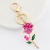 Llavero creativo coreano con forma de rosa de diamante para coche, accesorio para bolso de mujer, colgante de metal con flor, pequeño regalo