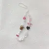 Cadena Minimalista para Teléfono con Perlas y Lazo, Correa de Muñeca, Cadena de Mano, Portacámaras y Llavero para Mujer