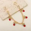 Corrente de bolsa de morango com laço cravejado de diamantes, best-seller transfronteiriço da Amazon, uma corrente extensora de bolsa e pingente delicada e elegante