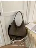 Bolsa feminina de estilo descontraído e grande capacidade, nova coleção 2026, apresentando um design fofo e leve, uma bolsa de ombro, uma bolsa de tecido e uma bolsa tote com estampa de leopardo para outono e inverno
