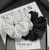 Temperamento minimalista francés liga para el pelo de intestino grueso punto blanco y negro estilo ins de alta gama goma elástica cuerda para coleta de celebridad de internet accesorios para el cabello
