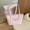Bolsa Grande Popular de Laço Feminina 2026 Novo Estilo Grande Capacidade Bolsa Tote de Bolinhas Bolsa de Ombro para Trabalho e Deslocamento