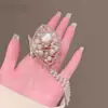 Nuevo Pinza de Agarre Pequeña con Borla de Concha para Mujer Pinza para el Cabello de la Parte Posterior de la Cabeza Pinza de Tiburón con Perla y Pedrería Accesorios para el Cabello