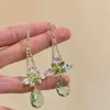 Estilo Nuevo de Principios de Primavera "Verde Montaña Primaveral" Pendientes Retro Verdes Florales con Gota de Agua y Borlas, Pendientes de Alta Gama y Lujosos