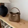 Diseño Nicho Estilo Coreano Bolso Cubo de Mano para Mujer 2026 Transfronterizo Nueva Moda Bolso Madre e Hijo Bolso de Hombro Cruzado Individual de PU