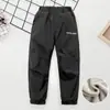 Pantalones de forro polar a prueba de viento e impermeables para niñas, adecuados para niños mayores, pantalones de primavera y otoño, forrados de polar para abrigar en otoño e invierno, pantalones de esquí modernos