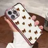 Capa para Celular com Airbag Simples Dourada Coração Marrom Laço Estilo Ins Mais Vendida da Tk Station para iPhone 17 Pro