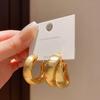 Pendientes de aro lisos multicapa con diseño de moda femenina, con diseño de viento metálico transfronterizo de Europa y Estados Unidos, pendientes exagerados de alto sentido, al por mayor