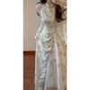 Estilo Nuevo Chino Xiaoxiang Tingzhu Cheongsam Elegante de Cuello Halter Mejorado con Retazos Jacquard y Falda de Gasa con Estampado Floral Etéreo
