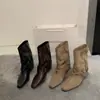 Botas de mujer de cuero suave con hebilla retro estilo páramo 2026 nuevo modelo punta fina botas cortas elegantes botas de montar a media pantorrilla de moda