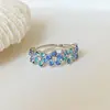Huajie Wish Empaquetado Individualmente Más Vendido Estilo Nuevo Pequeño Fresco y Elegante Floral Europeo y Americano Anillo Azul Diamante