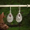 Pendientes Colgantes de Metal Hueco Rubí Creativos Retro Europeos y Americanos Más Vendidos Transfronterizos Moda para Mujer Pendientes de Fiesta Venta al por Mayor