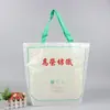 Película impermeable impresión a color bolsa tejida de PP portátil promoción publicitaria cremallera de piel de serpiente tejida bolsa de compras peritoneal portátil