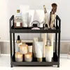 Estante de almacenamiento de escritorio de doble capa de venta caliente transfronterizo Estante de almacenamiento multifuncional perforado sin estante Estante para perfume y cosméticos