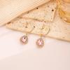Pendientes de botón con forma de gota de zafiro azul, incrustados con diamantes, estilo europeo y americano, simples, elegantes, novedad de alta calidad, para mujer, venta al por mayor