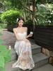 Novo estilo chinês movimentado vestido de férias à beira-mar feminino verão estilo francês puro desejo sexy sem costas alça vestido longo