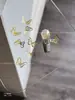 Arte de Unha Laço Joia de Liga Tridimensional Luxo Leve Dourado e Prateado Borboleta Oca Rebite Diamante de Unha Decoração Atacado