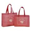 El fabricante suministra bolsas no tejidas hechas a medida, cosidas y laminadas, bolsas de embalaje para regalo al por mayor y bolsas promocionales