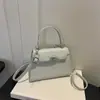 Bolsa Pequena Feminina Outono Versátil 2026 Nova Tendência Moda Bolsa Transversal Padrão Crocodilo Bolsa Quadrada Pequena de Mão Bolsa com Fivela de Travamento