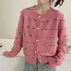 Nueva colección de primavera y otoño: Cárdigan de punto a rayas de colores con un estilo dulce y suave, con botones en forma de corazón, perfecto como suéter o prenda exterior para mujer