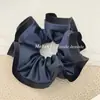 Estilo Coreano Estilo Perezoso Borde Negro Satén Gama Alta Goma para el Cabello Diadema Elegante Bola Cuerda para Cola de Caballo Femenina
